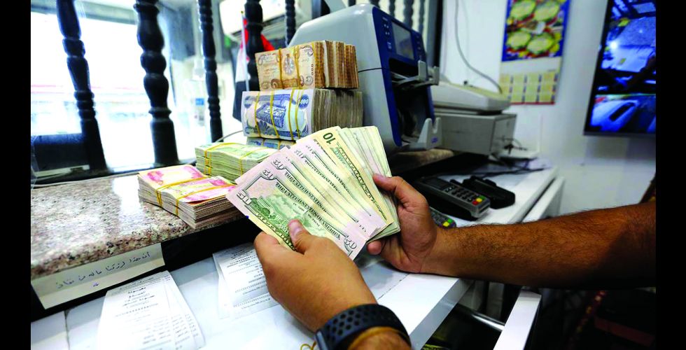Baghdad The International Monetary Fund is negotiating to determine the exchange rate