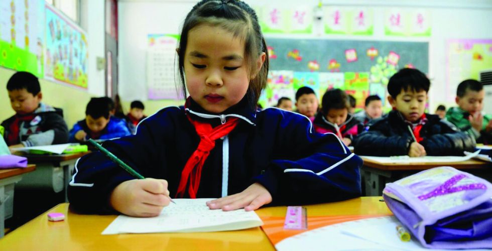 قانون صيني يحدّ من واجبات التلاميذ